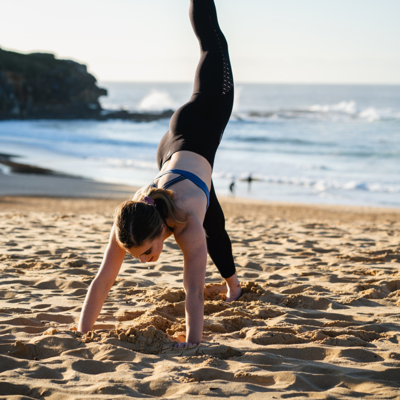 Take a sunrise beach yoga class
