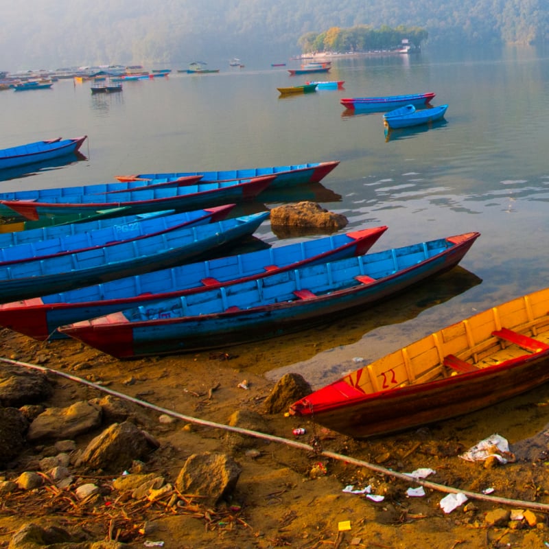 Boat on Phewa Lake and learn local folklore